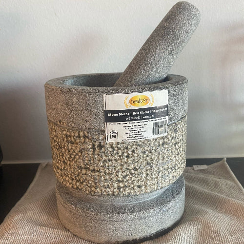 Grinding stone (ගල් වංගෙඩිය)